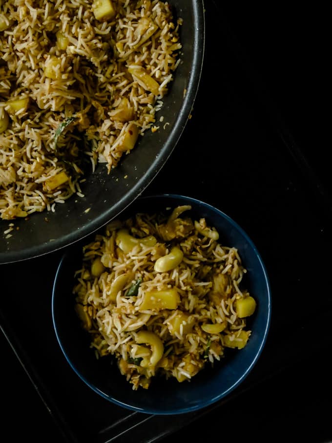 Pineapple chicken fried rice(one-pot meals). Chicken and PIneapple are stir-fried in spices then mixed together with rice to create both a budget-friendly and time- saving one-pot meal.
