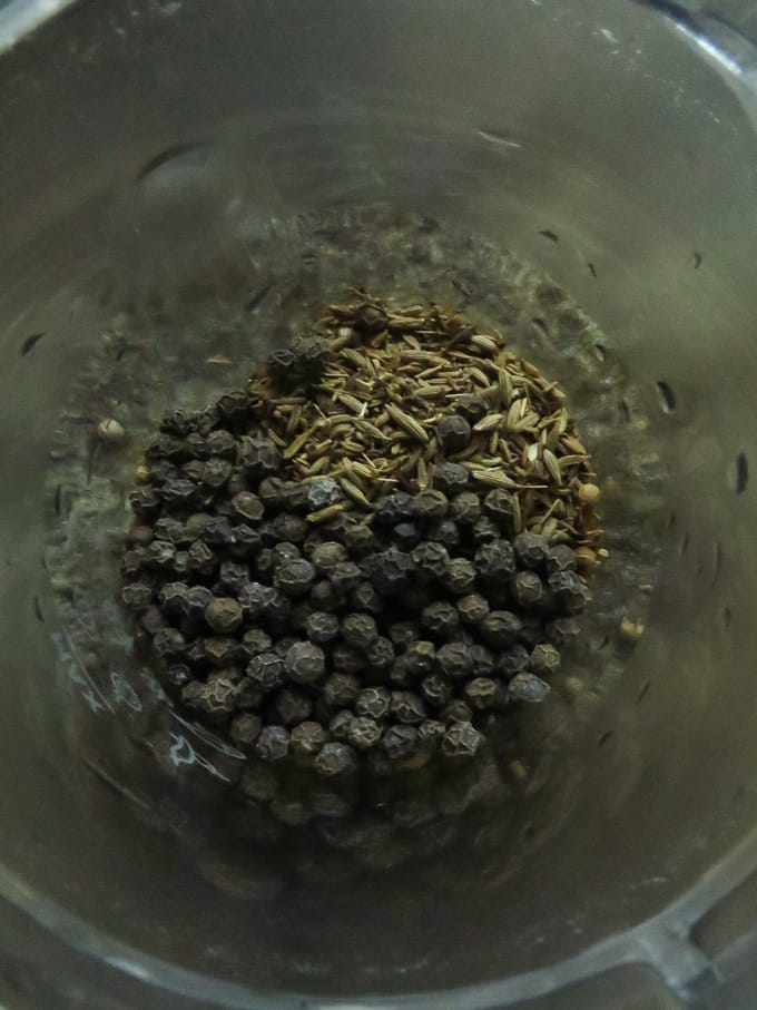 grinding pepper and cumin for the rasam powder.