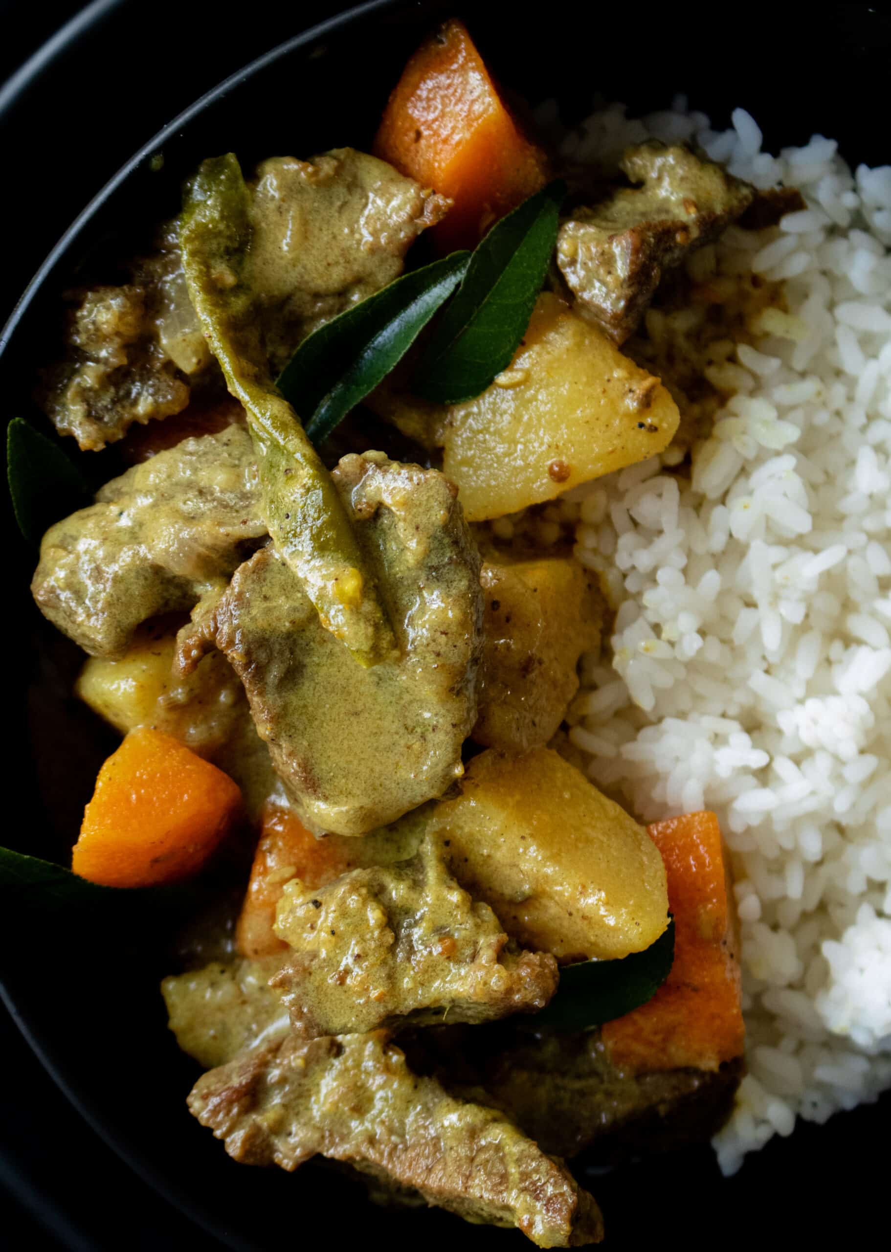 coconut curry beef stew with carrots and potatoes. | ISLAND SMILE