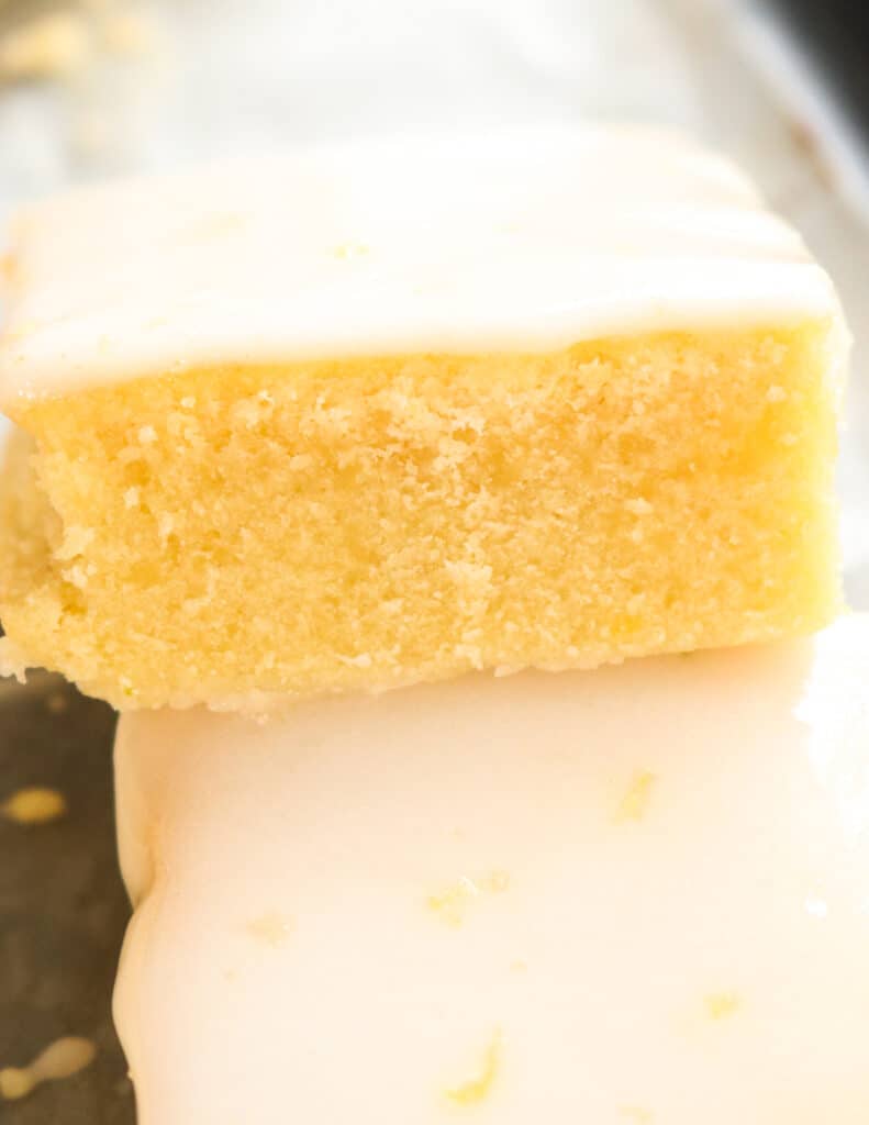 lemon cake slices with a smooth lemon ice glazing.