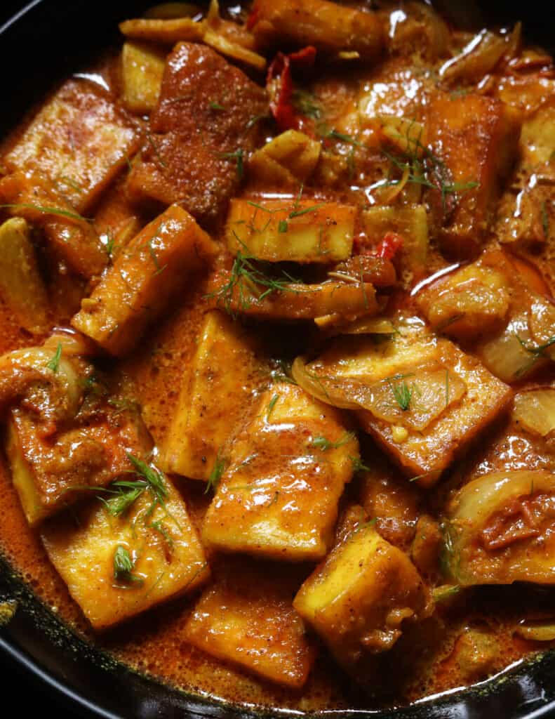 paneer cooked in coconut milk and garnished.