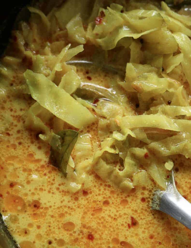 sliced cabbage cooked in coconut milk.