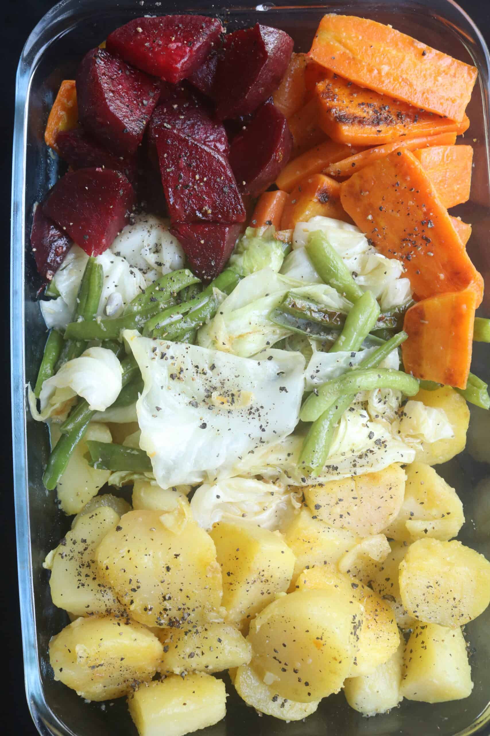 mixed vegetables with pepper and salt in a pyrex dish.