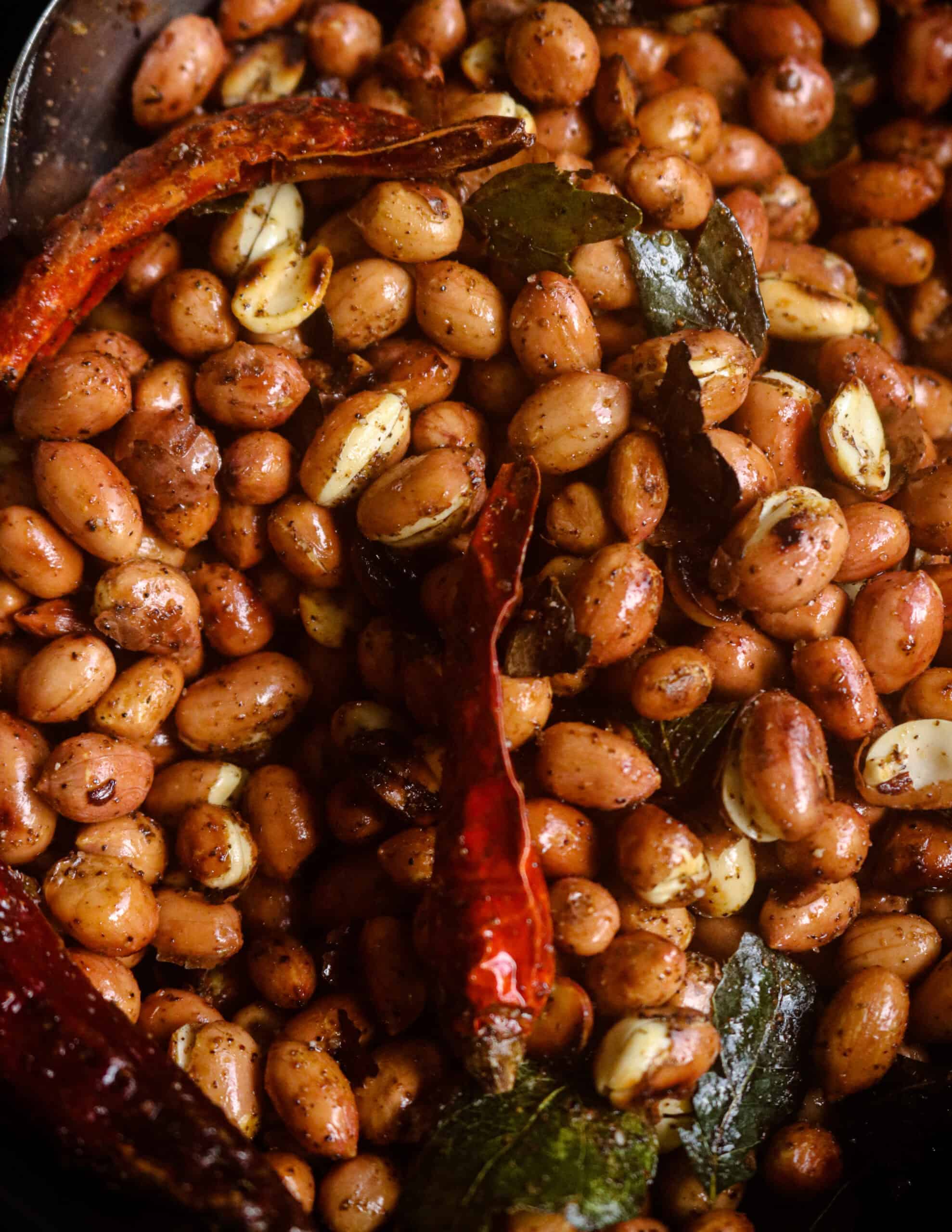 spicy peanuts roasted in a pan.