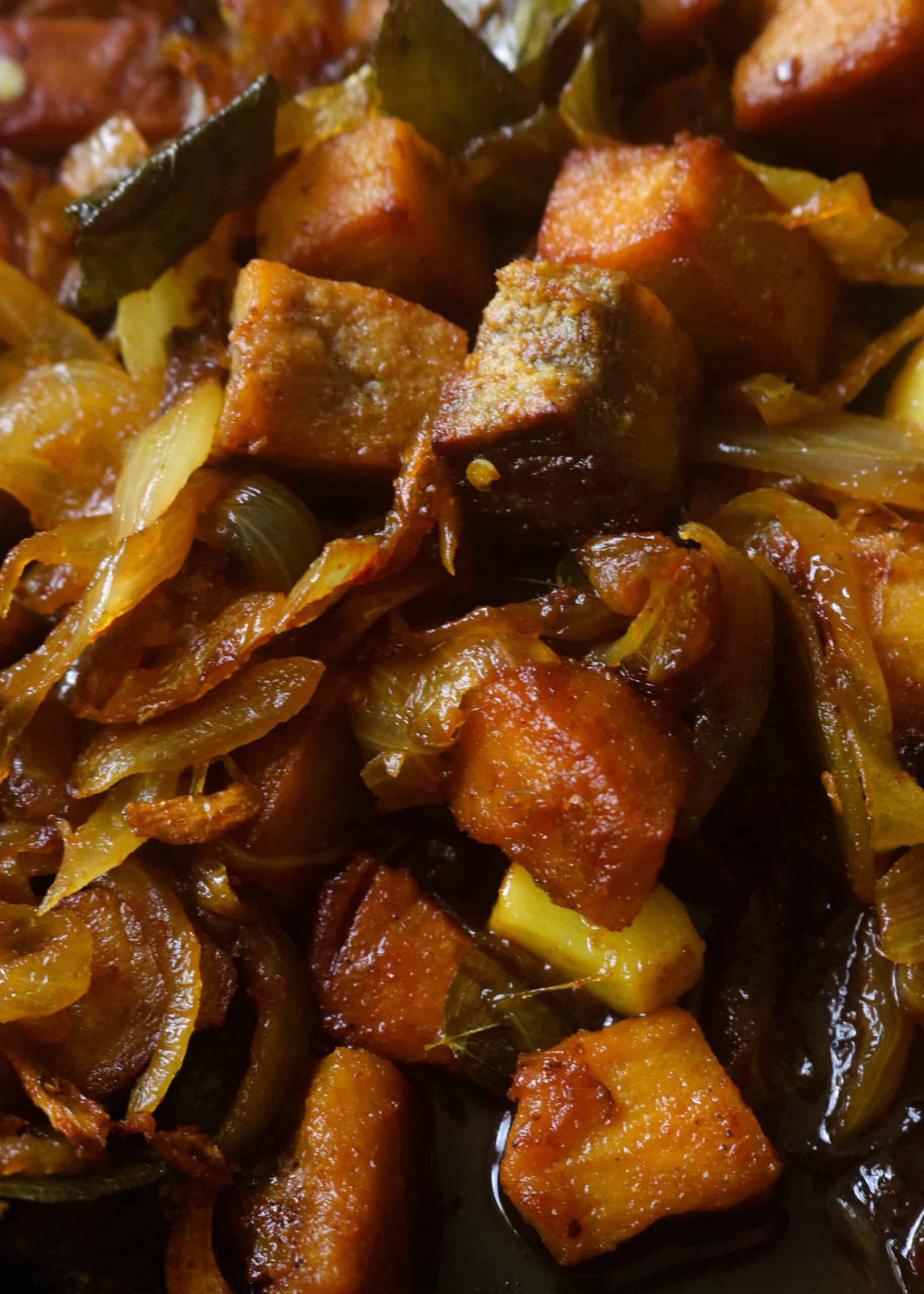 Sri lankan dry fish stir fry with onions, curry leaves and spices.